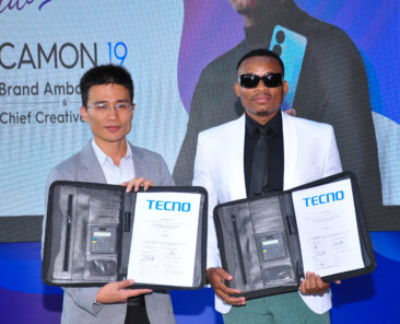 From Right, Otile Brown and TECNO Mobile Kenya Brand Manager Peter Shi during his unveiling as the Chief Creative Officer for CAMON19 Series..